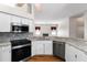 Well-equipped kitchen featuring stainless steel appliances and stylish backsplash at 2803 Bent Leaf Dr, Valrico, FL 33594