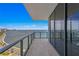 Private balcony featuring panoramic views and modern glass railings at 2912 W Santiago St # 1401, Tampa, FL 33629