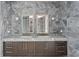 A primary bathroom featuring a large marble countertop and double sinks at 2912 W Santiago St # 1401, Tampa, FL 33629