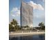 Striking exterior of a high-rise building with contemporary design and lush landscaping at 2912 W Santiago St # 1401, Tampa, FL 33629
