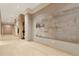 Modern hallway with wood floors and art at 2912 W Santiago St # 1401, Tampa, FL 33629