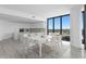 Bright kitchen and dining area featuring floor-to-ceiling windows and modern finishes at 2912 W Santiago St # 1401, Tampa, FL 33629
