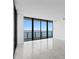 Bright living room featuring floor-to-ceiling windows and modern finishes at 2912 W Santiago St # 1401, Tampa, FL 33629