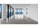 Bright and airy living room featuring floor-to-ceiling windows with beautiful water views at 2912 W Santiago St # 1401, Tampa, FL 33629