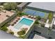 Aerial view of a luxury swimming pool with lounge area and manicured landscaping at 2912 W Santiago St # 1401, Tampa, FL 33629