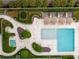 Overhead shot of luxurious pool, spa, garden and lounge area at 2912 W Santiago St # 1401, Tampa, FL 33629