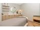 Spa room featuring a massage table, orchids, shelves, and cabinetry at 2912 W Santiago St # 1401, Tampa, FL 33629