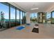 Bright yoga studio with floor to ceiling windows overlooking the ocean at 2912 W Santiago St # 1401, Tampa, FL 33629