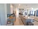 Spacious kitchen with a large island, granite countertops, stainless steel appliances, and tile flooring at 32313 Conchshell Sail St, Wesley Chapel, FL 33545
