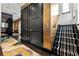 Elegant hallway featuring a staircase with striped carpet and an elevator for easy access to all floors at 325 2Nd N St, St Petersburg, FL 33701