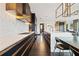 This updated kitchen features modern cabinets, quartz counters and stainless appliances at 325 2Nd N St, St Petersburg, FL 33701