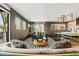 The living room features an open floor plan with modern black and white rug and gold accents at 325 2Nd N St, St Petersburg, FL 33701