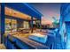 Entertain on this beautiful rooftop deck with a built-in fire pit, outdoor kitchen, and dining area with sunset views at 325 2Nd N St, St Petersburg, FL 33701
