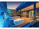 Enjoy an amazing rooftop terrace with an outdoor kitchen, cozy seating, fire pit, and custom lighting at 325 2Nd N St, St Petersburg, FL 33701