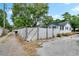 Exterior of house and yard featuring fencing and adjacent street at 4102 Haines N Rd, St Petersburg, FL 33703