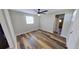 Bedroom featuring wood-look flooring, a closet, and a window providing natural light at 4331 Fairfield S Ave, St Petersburg, FL 33711