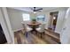 Dining room with hardwood floors, neutral walls, and modern light fixture at 4331 Fairfield S Ave, St Petersburg, FL 33711