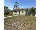 Charming home with green grass and a sidewalk leading to the front entrance at 4331 Fairfield S Ave, St Petersburg, FL 33711