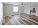 Bright living room with wood floors, natural light, and an open layout at 4331 Fairfield S Ave, St Petersburg, FL 33711