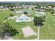 Aerial view of community amenities including pool, tennis, and volleyball at 4722 Millpond Ln, Tampa, FL 33624