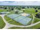 Aerial view of community sports courts including tennis and basketball at 4722 Millpond Ln, Tampa, FL 33624