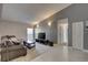 Comfortable living room features neutral walls and tile floors at 4722 Millpond Ln, Tampa, FL 33624