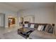 Open-concept living room showcasing tile floors and neutral paint at 4722 Millpond Ln, Tampa, FL 33624