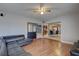 Open-concept living room showcases beautiful laminate floors at 4722 Millpond Ln, Tampa, FL 33624