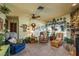Cozy living room with stone fireplace, plush seating, and decorative accents, creating a warm atmosphere at 50 Pembrook Cir, Palm Harbor, FL 34683