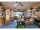 Office space featuring tile floors, a ceiling fan, and an office desk at 50 Pembrook Cir, Palm Harbor, FL 34683