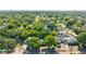 An aerial view of a residential neighborhood showcasing lush greenery and peaceful streets at 5302 S Himes Ave, Tampa, FL 33611