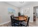 Dining area featuring a wooden table and seating for Gathering meals or entertaining guests at 5302 S Himes Ave, Tampa, FL 33611