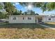 Charming single-story home with a well-maintained lawn and cozy front porch at 5302 S Himes Ave, Tampa, FL 33611