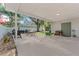 Covered patio with string lights offers a great outdoor space for relaxation and dining at 5302 S Himes Ave, Tampa, FL 33611