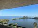 Scenic balcony view overlooking tranquil bay waters and lush islands, offering a serene escape at 5915 Sea Ranch Dr # 512, Hudson, FL 34667