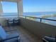 Scenic waterfront view from the balcony with seating for two at 5915 Sea Ranch Dr # 512, Hudson, FL 34667