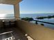 Relaxing balcony overlooking a scenic waterfront view with ample seating at 5915 Sea Ranch Dr # 512, Hudson, FL 34667