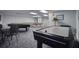 A game room features an air hockey table, pool table, ping pong, and seating at 5915 Sea Ranch Dr # 512, Hudson, FL 34667
