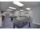 Large game room featuring foosball, pool table, poker table, books and television at 5915 Sea Ranch Dr # 512, Hudson, FL 34667