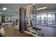 Weight machine and mirrored wall feature in this community gym at 5915 Sea Ranch Dr # 512, Hudson, FL 34667