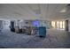 A spacious lounge with a TV, ample seating, and carpeted floors at 5915 Sea Ranch Dr # 512, Hudson, FL 34667