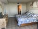 Cozy main bedroom featuring a queen-sized bed and light wood dresser at 5915 Sea Ranch Dr # 512, Hudson, FL 34667