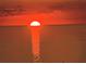 Beautiful sunset view over the ocean with sun reflecting on the water at 5915 Sea Ranch Dr # 512, Hudson, FL 34667