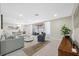 Spacious open-concept living space seamlessly integrates indoor comfort with outdoor views and natural light at 6345 Dartmouth N Ave, St Petersburg, FL 33710