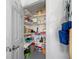 Walk-in pantry with floor to ceiling storage, canned goods, and plenty of space at 6345 Dartmouth N Ave, St Petersburg, FL 33710