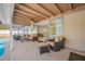 Outdoor patio with comfortable seating and shaded space for entertaining with a view of the pool at 6345 Dartmouth N Ave, St Petersburg, FL 33710