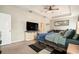 Comfortable bedroom with ceiling fan and modern furnishings at 6477 Dutton Dr, Wesley Chapel, FL 33545