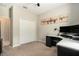 Cozy bedroom with office area, modern desk and large closet at 6477 Dutton Dr, Wesley Chapel, FL 33545
