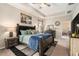 Spacious main bedroom with a ceiling fan, and neutral décor at 6477 Dutton Dr, Wesley Chapel, FL 33545