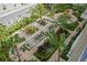 Courtyard featuring a fountain, lush tropical plants, walkways and a pergola at 700 S Harbour Island Blvd # 547, Tampa, FL 33602